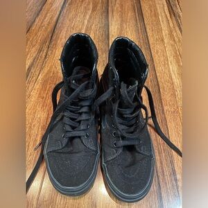 Vans only used once for a costume. Size 6 in women.